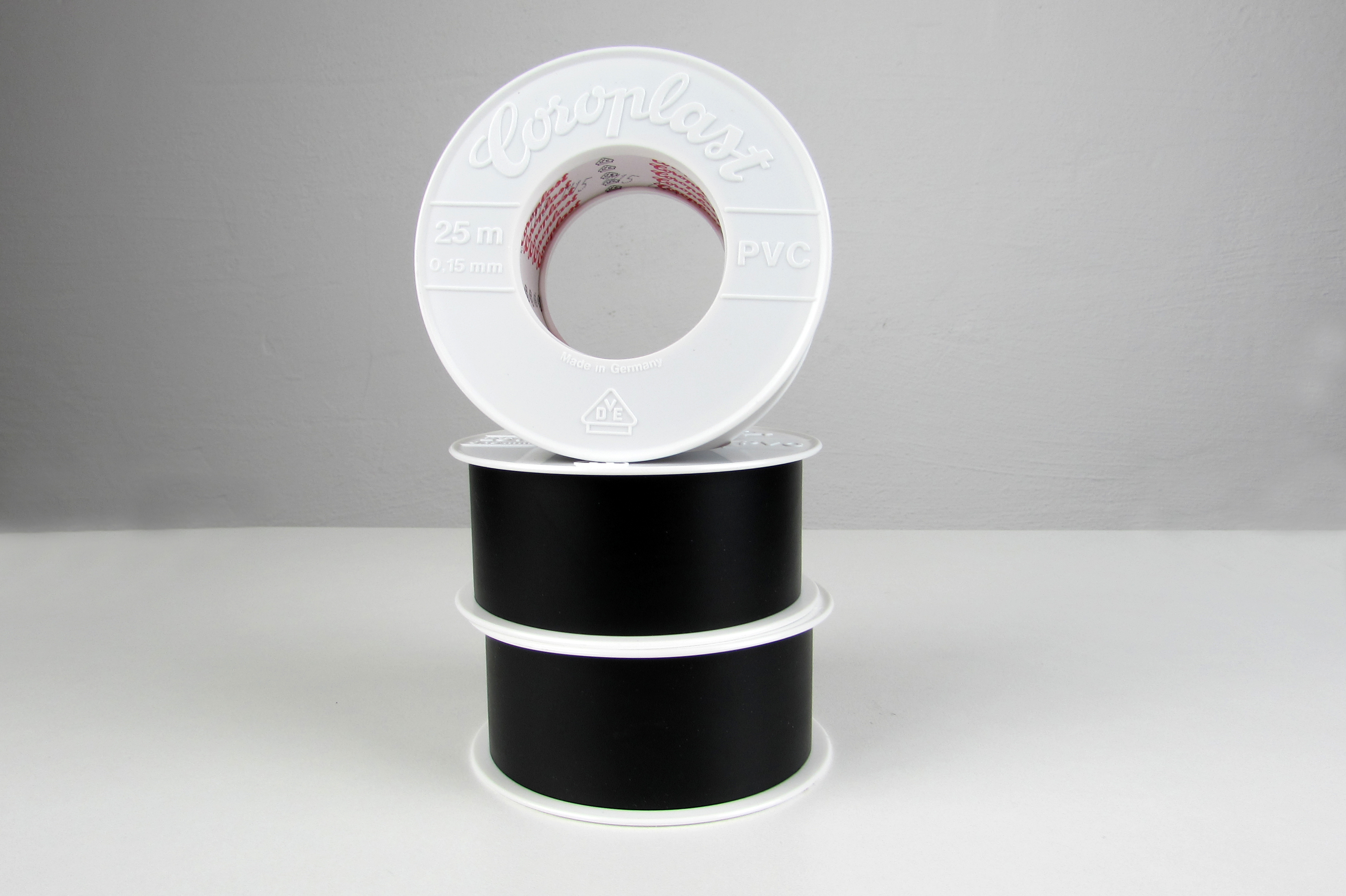 drei Rollen Coroplast PVC-Isolierband